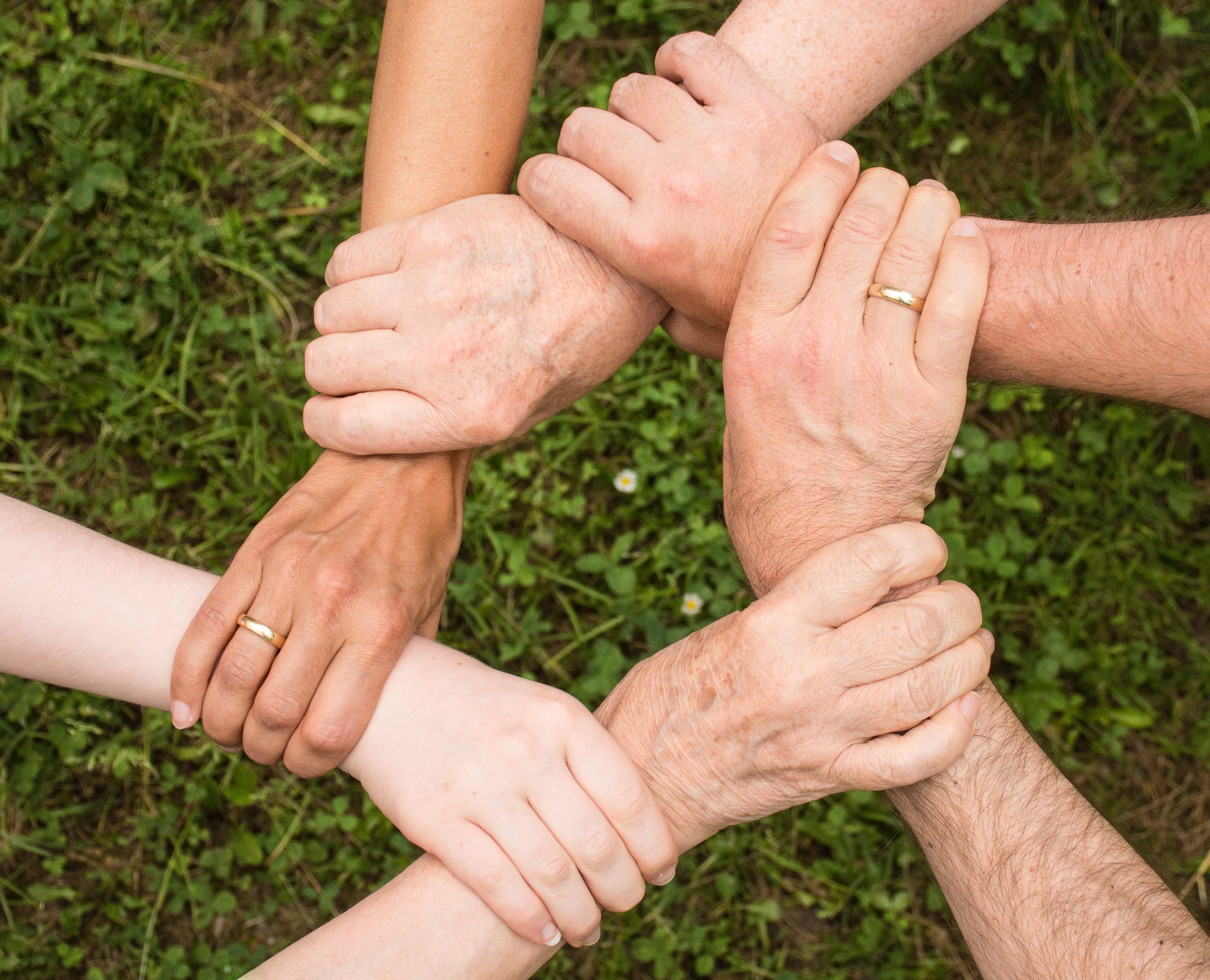 Hands connecting in a circle