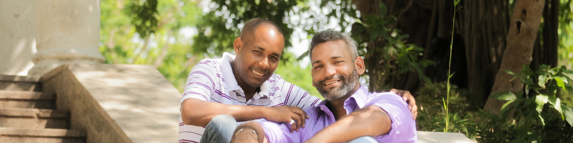 Two man sitting on steps