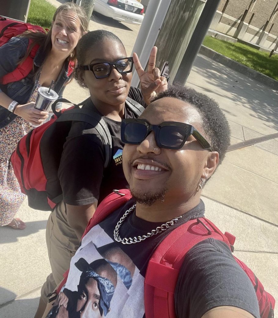Members of our street outreach team smile and pose for a selfie