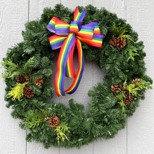Fresh green wreath with rainbow bow